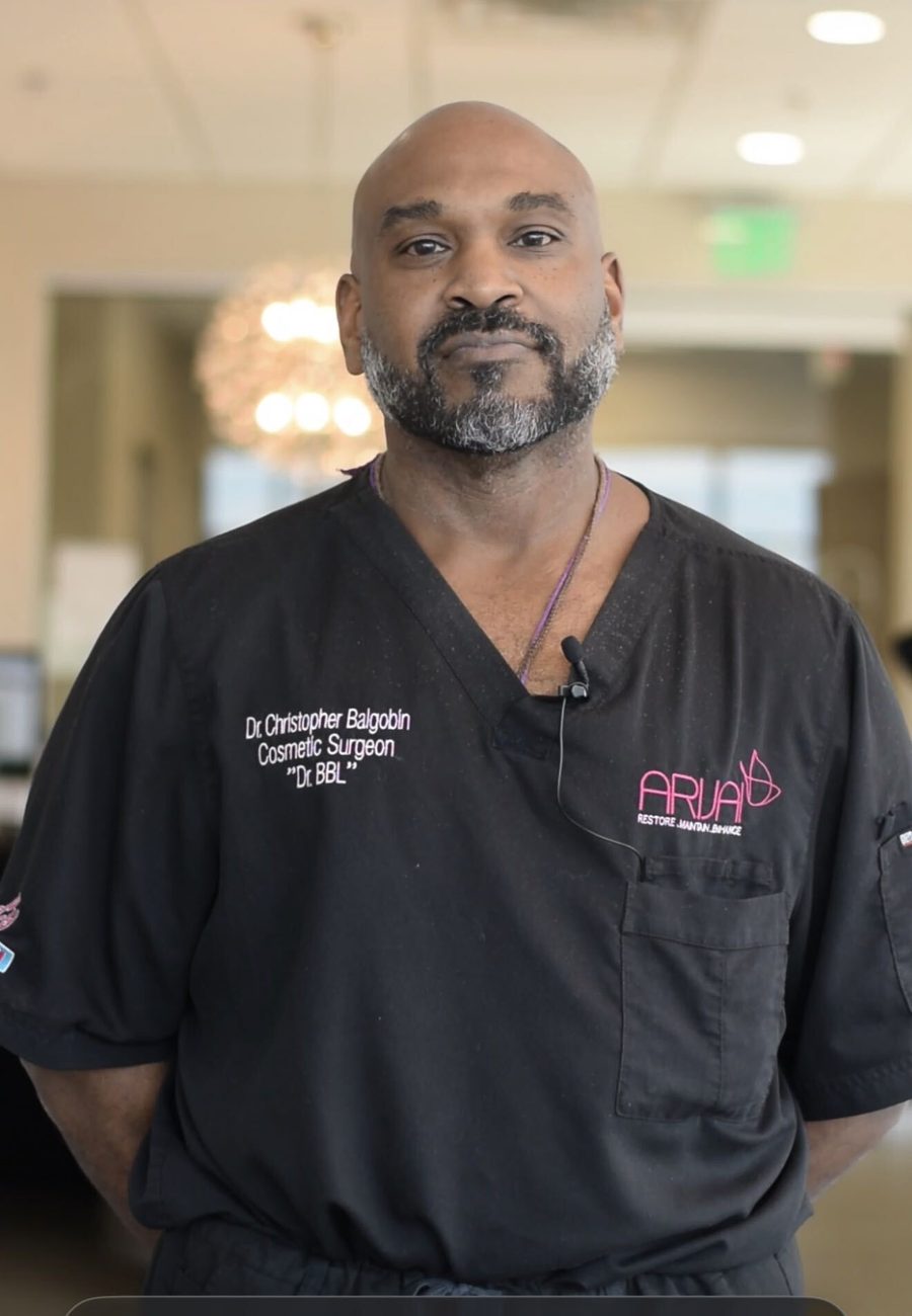 Dr. Balgobin in scrubs at Arijai Aesthetics & Wellness